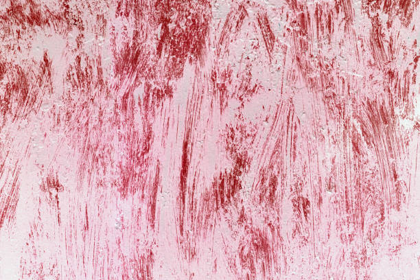 istock . Red-pink paint stains on canvas. Creative artistic backdrop. 1220674563