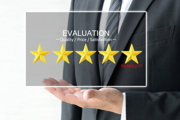 Business man's hand and 5 stars evaluation