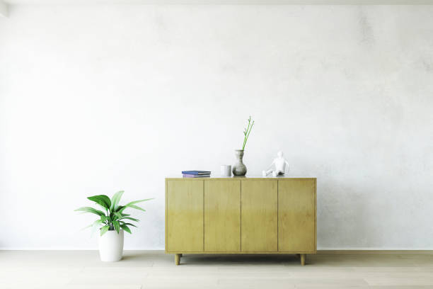 istock Stylish Interior Room with Vintage Commode near the Old Wall. 1220682813