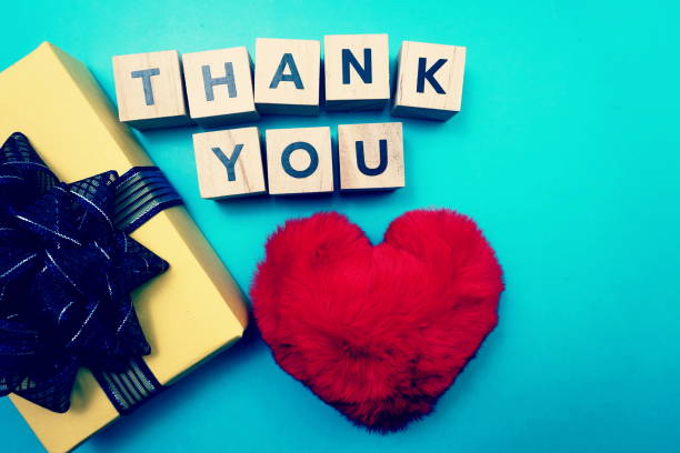 istock Thank You alphabet letters  with space copy on blue background 1220693547