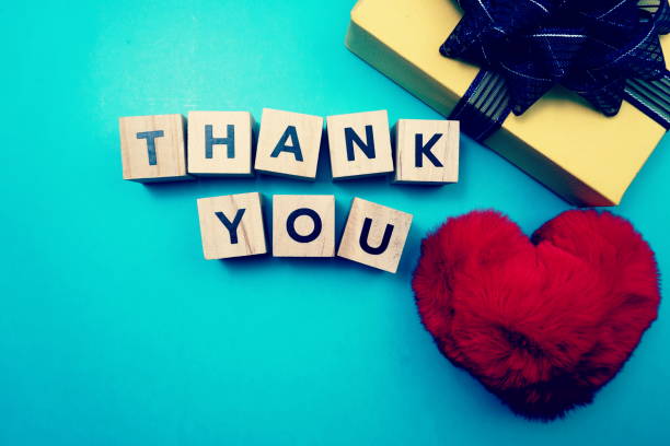 istock Thank You alphabet letters  with space copy on blue background 1220693552