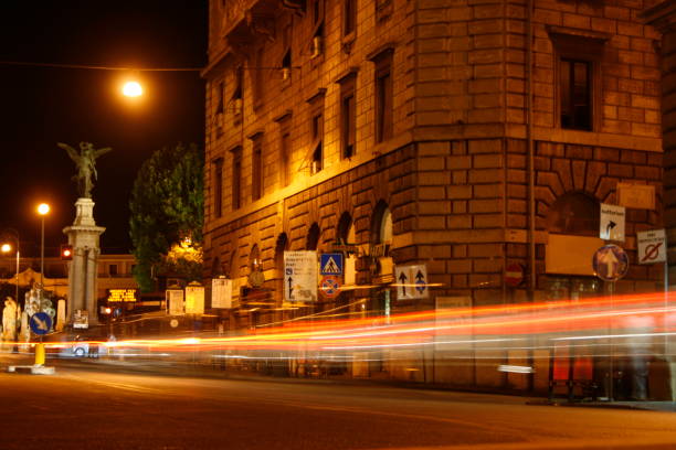 Rome street views car lights effect and facades in Rome, Italy