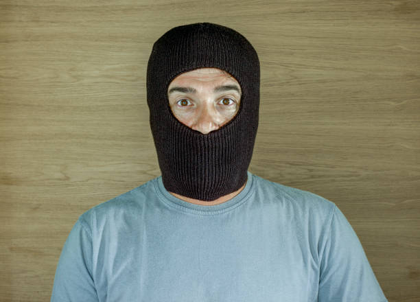 istock Burglar wearing a ski mask 1220703354