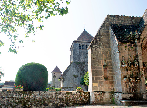 The main facade of Beauport Abbey, a roofless gothic building located in Paimpol, Cotes d'Armor, Brittany, France. August 2023, sunset view.