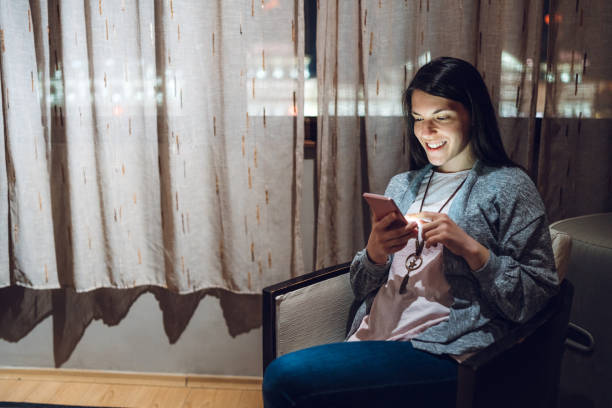 istock Woman in lockdown chatting online 1220705360