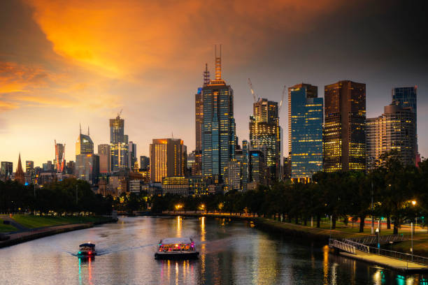 Landscape of Melbourne City over Maribyrnong River and Footscray Park Landscape of Melbourne City over Maribyrnong River and Footscray Park. Crowded modern office buildings in Melbourne's CBD in sunset. yarra river stock pictures, royalty-free photos & images