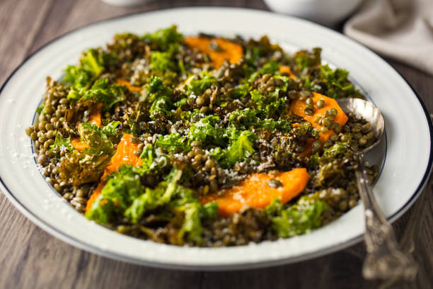 istock crispy kale and green lentils,roasted butternut squash salad 1220710403