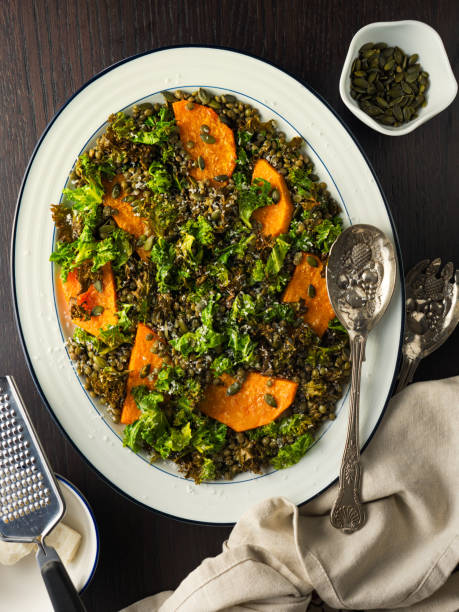 istock crispy kale and green lentils,roasted butternut squash salad 1220710421