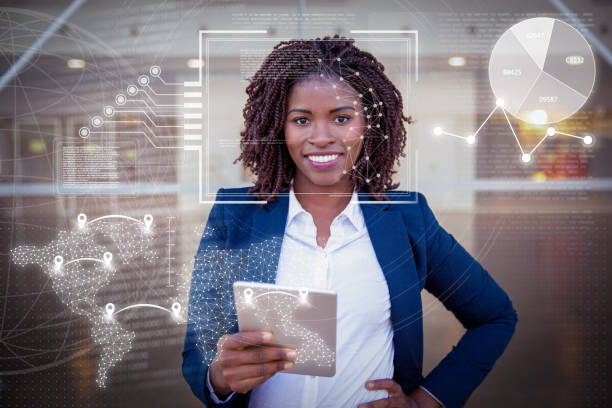 istock Woman holding tablet outside and virtual identification graphics 1220711143