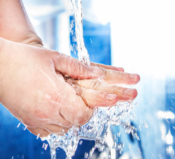 istock Hand in the stream of water. 1220711167