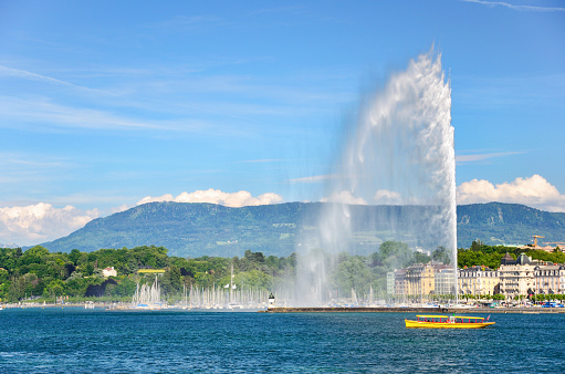 Jet D'eau fountain and Swiss flag on Lake Geneva, Switzerland