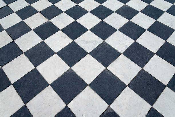 istock Black and white tiles. Chess floor. 1220713558