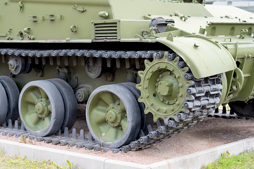 Tank caterpillar tread with wheels. Modern military equipment.