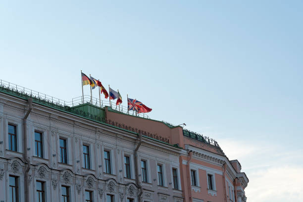 istock Different flags over the building in St. Petersburg. 1220718129