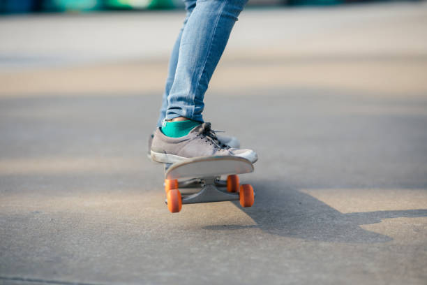 istock Skateboarder legs skateboarding at outdoors 1220718309