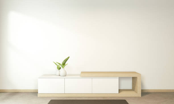 istock Tv cabinet in tropical empty room Japanese - zen style,minimal designs. 3D rendering 1220722420