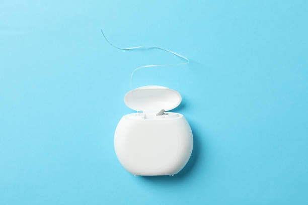 istock Dental floss on blue background, space for text 1220722450