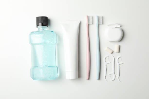 istock Flat lay with tools for dental care on white background 1220722703