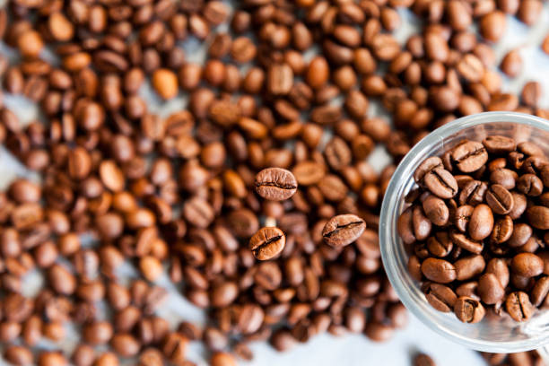 istock coffee beans and coffee beans in a glass 1220722945