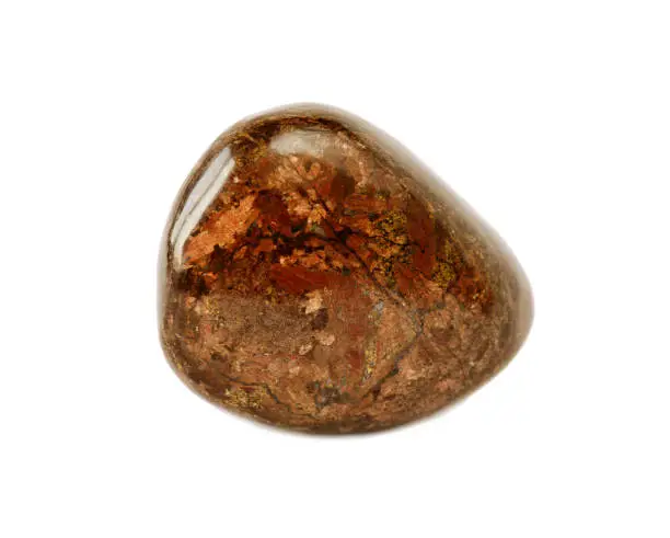 Collectible specimen of the mineral Bronzite (Enstatite), processed in the form of smooth pebbles, isolated on a white background