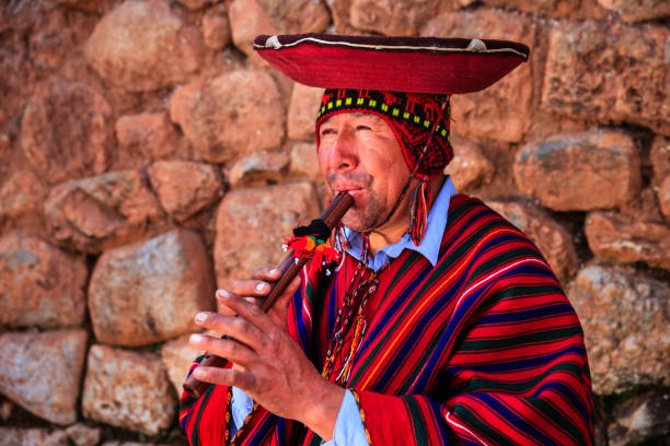 istock Portrait of Peruvian man playing a flute, Sacred Valley 1220723449