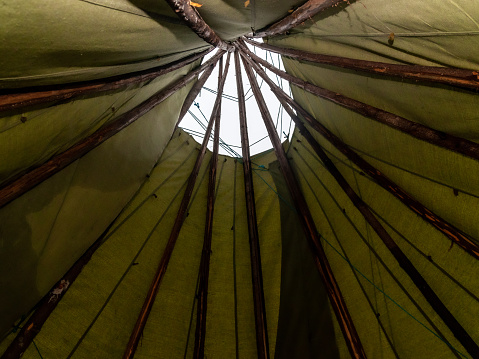 the top of the wigwam is photographed from the inside