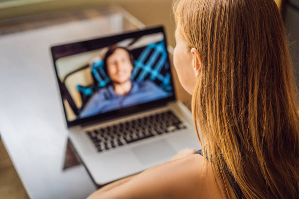 istock Man and woman are talking through a video call 1220728730