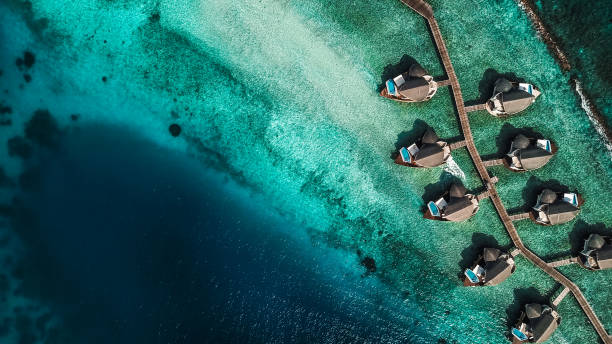 istock Maldives Island Lagoon with Water Villas 1220728826