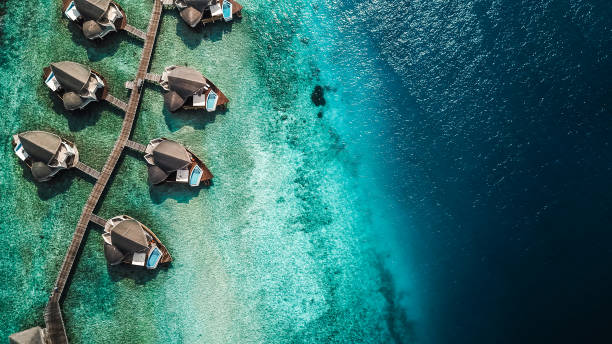 istock Maldives Island Lagoon with Water Villas 1220728834