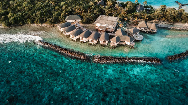 istock Tropical Overwater Bungalows at Maldives Island 1220728902