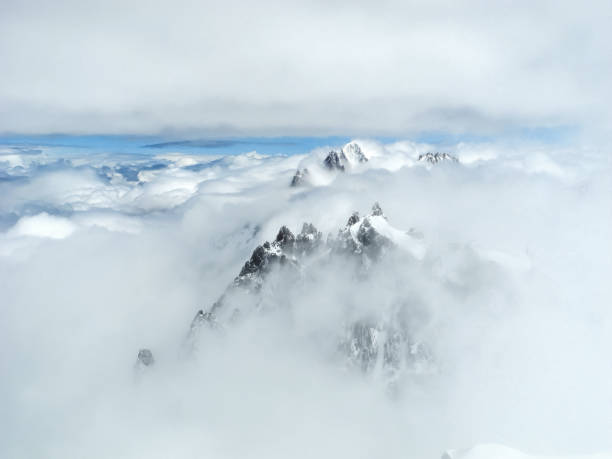 istock Mont Blanc peak in the clouds, Chamonix France 1220729321