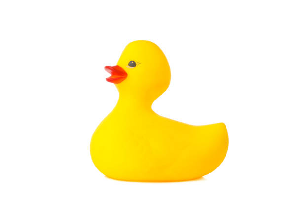 istock Yellow rubber duck isolated on white background 1220730660