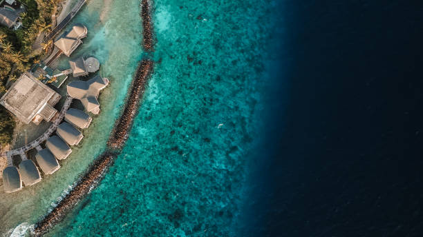 istock Tropical Overwater Bungalows at Maldives Island 1220730819