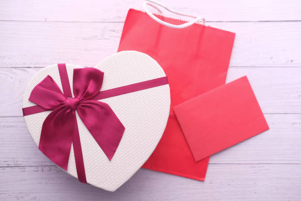 istock high angle view of heart shape gift on table 1220730873