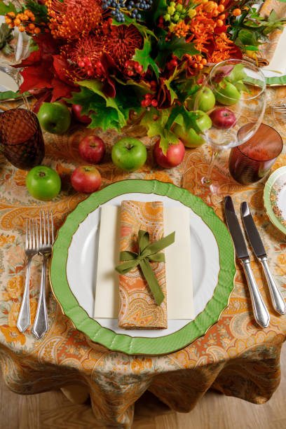 istock table setting with a plate, napkin and bouquet on a tablecloth 1220730968