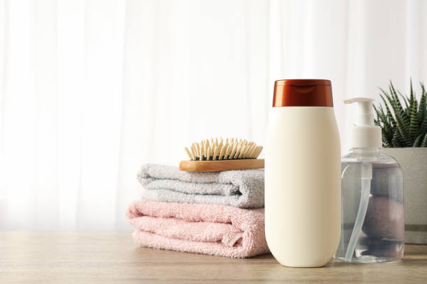 istock Composition with hair care products on wood table 1220731869