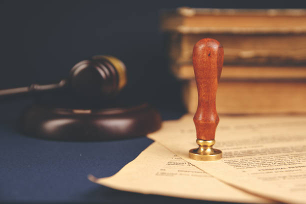 istock Notary's public pen and stamp on testament and last will. Notary public 1220731870