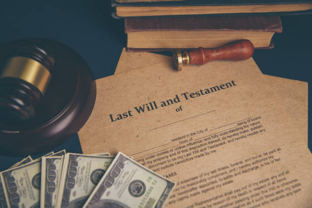 istock Notary's public pen and stamp on testament and last will. Notary public 1220731881