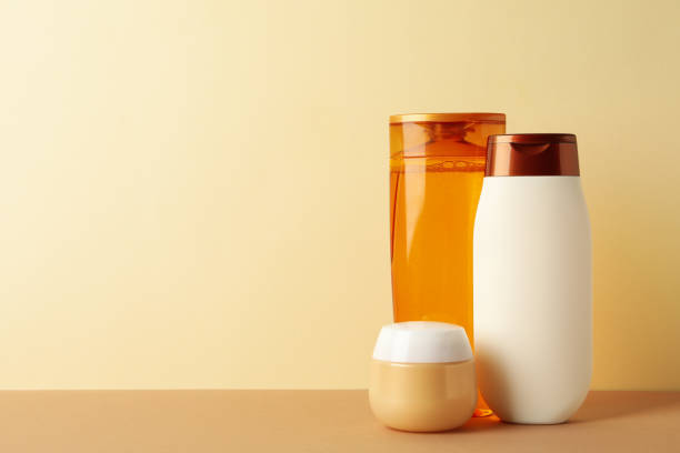 istock Blank cosmetic bottles on beige background, space for text 1220732087