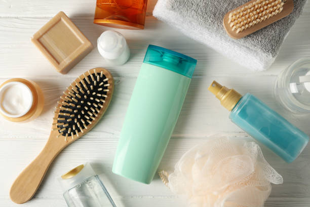 istock Composition with hair care products on wooden table. Blank space for label 1220732947