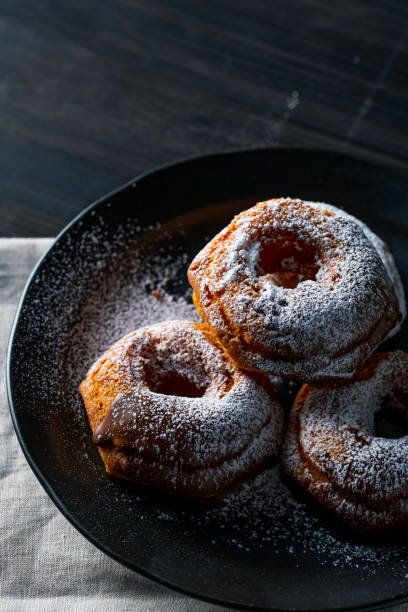 istock Delicious donut image. Sprinkled powdered sugar on donuts. 1220733779