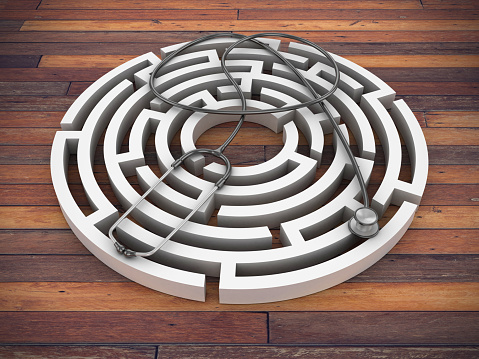 Circular Maze with Stethoscope on Wood Floor - 3D Rendering