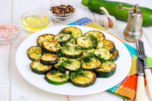 istock Grilled zucchini with garlic and herbs. Photo 1220736714