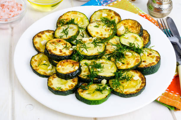 istock Grilled zucchini with garlic and herbs. Photo 1220736719