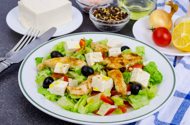 istock Vegetable salad with tofu and chicken breast. 1220737427