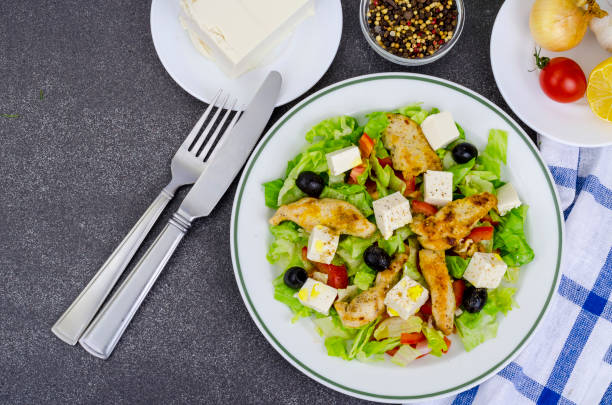 istock Vegetable salad with tofu and chicken breast. 1220737439