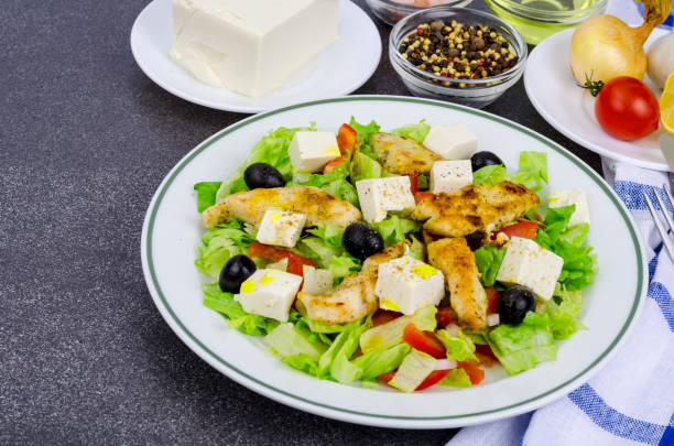 istock Vegetable salad with tofu and chicken breast. 1220737440
