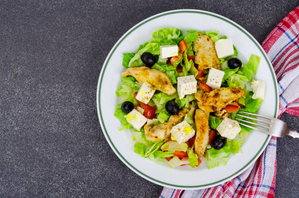 istock Vegetable salad with tofu and chicken breast. 1220737446