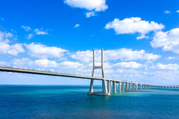 istock Famous Vasco da Gama Bridge over River Tejo in Lisbon from above 1220738964