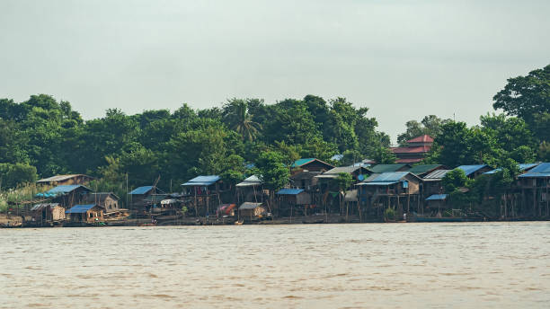 istock Life along the river, people wash clothes. 1220740229